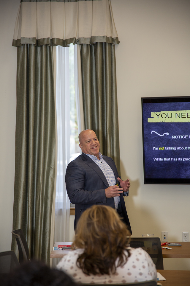 James Vasquez presenting business strategy during a workshop